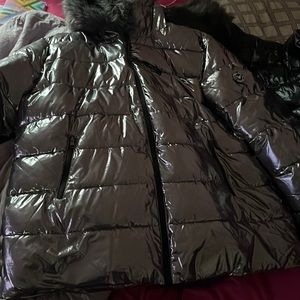 Silver and black coats one all silver one all black double u can get both